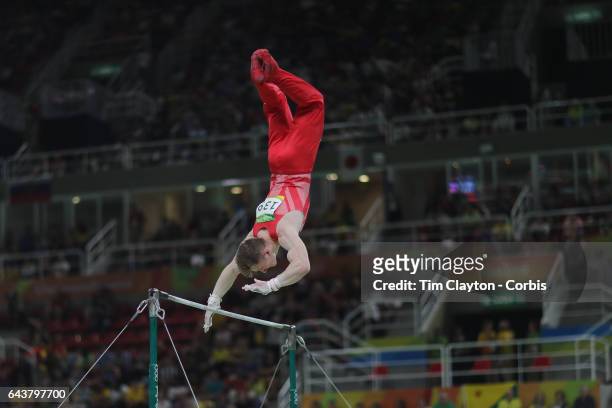 Gymnastics - Olympics: Day 3 Nile Wilson of Great Britain performing his Horizontal Bar routine during the Artistic Gymnastics Men's Team Final at...