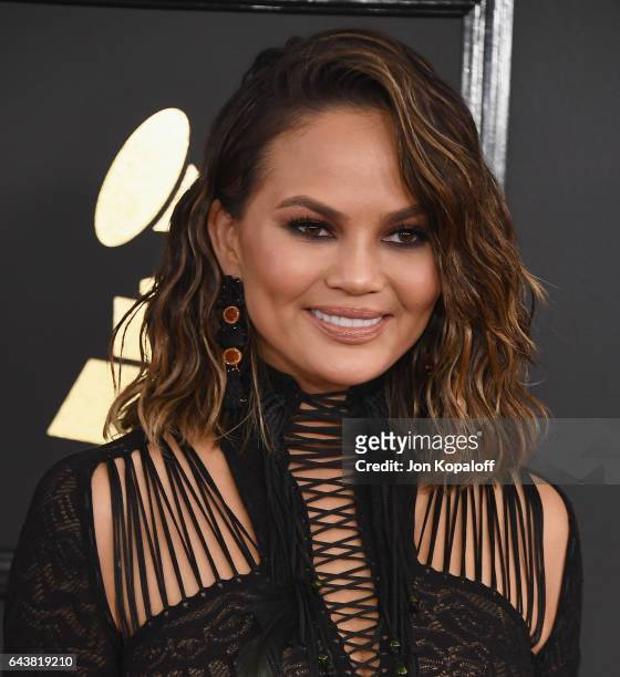 Model Chrissy Teigen arrives at the 59th GRAMMY Awards at the Staples Center on February 12, 2017 in Los Angeles, California.