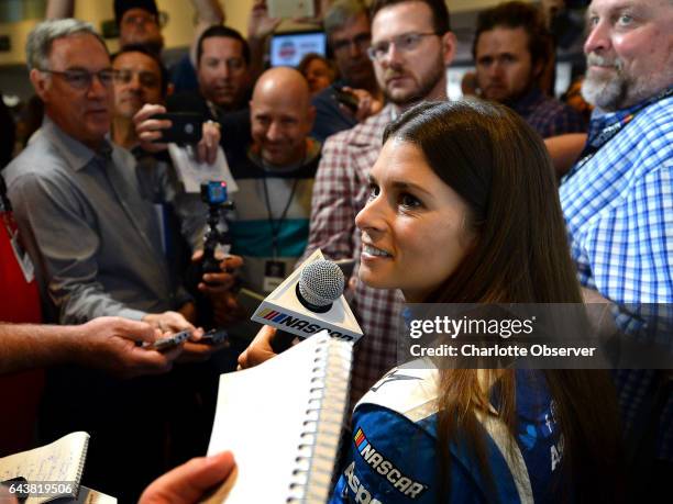 Driver Danica Patrick listens to a reporter's question during the Daytona 500 Media Day Feb. 22, 2017 at the Daytona International Speedway in...