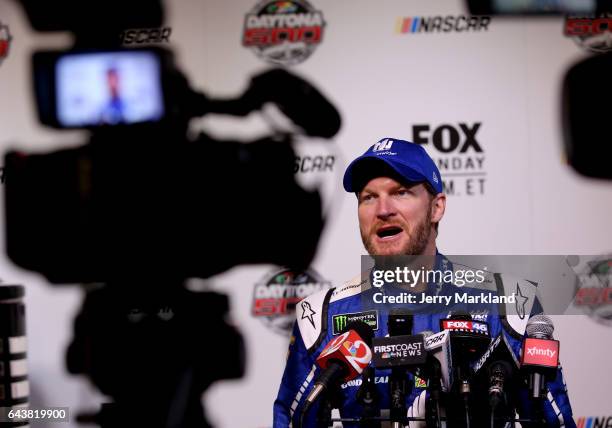 Dale Earnhardt Jr., driver of the Nationwide Chevrolet, speaks with the media during the Daytona 500 Media Day at Daytona International Speedway on...