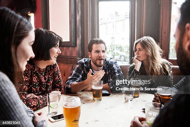 group of friends at a pub - pub bar bildbanksfoton och bilder