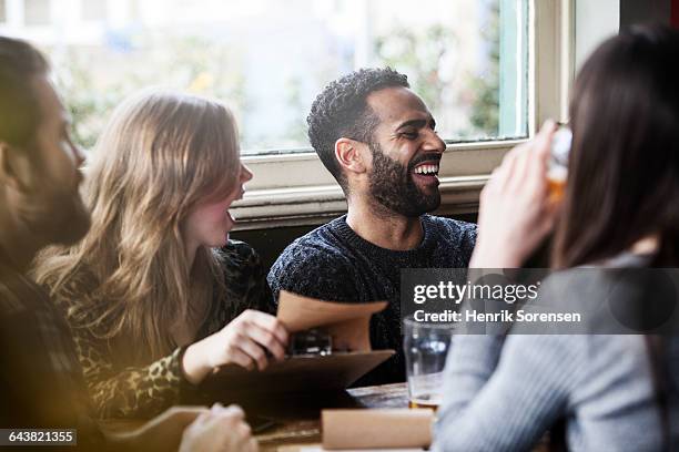 friends at the local pub - bar atmosphere stock pictures, royalty-free photos & images