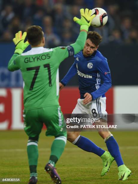 Schalke's midfielder Leon Goretzka tries to score past PAOK's goalkeeper Panagiotis Glykos during the UEFA Europa League round of 32 second-leg...