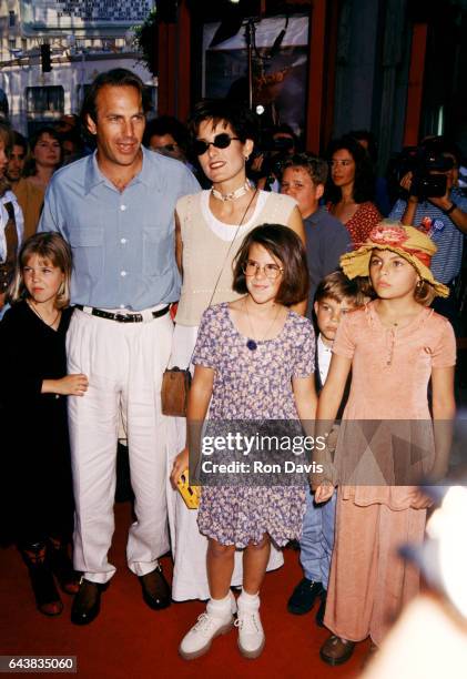 Actor Kevin Costner poses for a portrait with his ex-wife and children Cindy Costner, Annie, Lily and Joe arrive for the "Wyatt Earp" Hollywood...