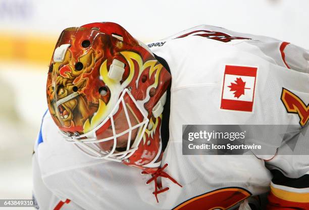 The artwork on the top of the mask of Calgary Flames goalie Brian Elliott is shown during the NHL game between the Nashville Predators and the...