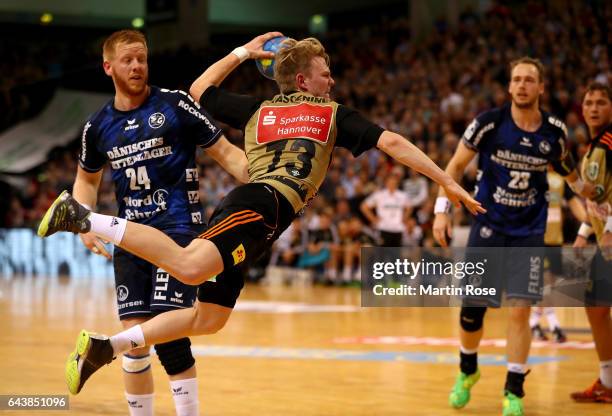 Timo Kastening of Hannover-Burgdorf throws at goal during the DKB HBL Bundesliga match between SG Flensburg-Handewitt and TSV Hannover-Burgdorf on...
