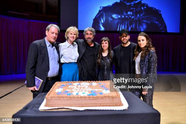 Author Paul Auster, Siri Hustvedt, Mitchell Kaplan, Brittany Anjou, Magicians David Blaine and Singer Sophie Auster pose for picture onstage after...