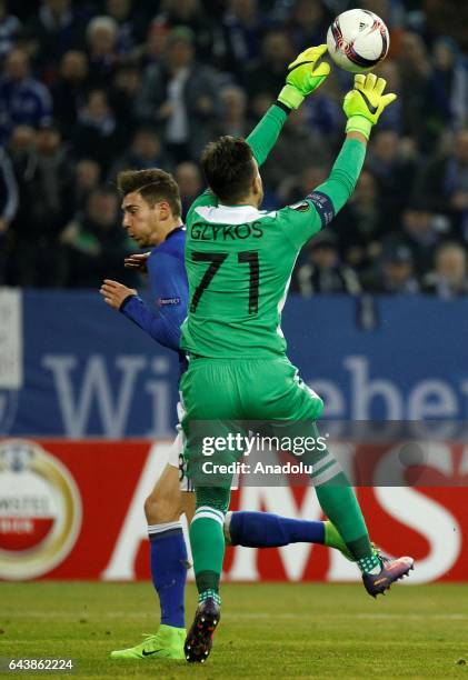 Leon Goretzka of FC Schalke 04 in action with Panagiotis Glykos of PAOK FC during their UEFA Europa League round of 32 soccer match between FC...