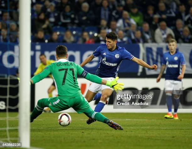 Alessandro Schoepf of FC Schalke 04 in action with Panagiotis Glykos of PAOK FC during their UEFA Europa League round of 32 soccer match between FC...