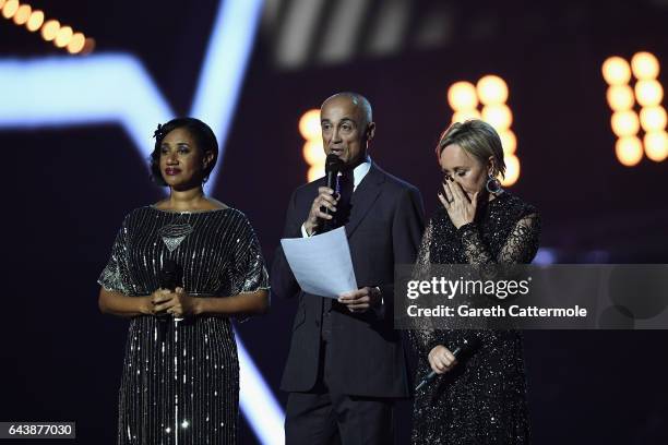 Pepsi DeMacque, Andrew Ridgeley and Shirlie Holliman present a tribute to George Michael on stage at The BRIT Awards 2017 at The O2 Arena on February...