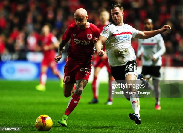 Tomas Kalas of Fulham is tackled by David Cotterill of Bristol City during the Sky Bet Championship match between Bristol City and Fulham at Ashton...