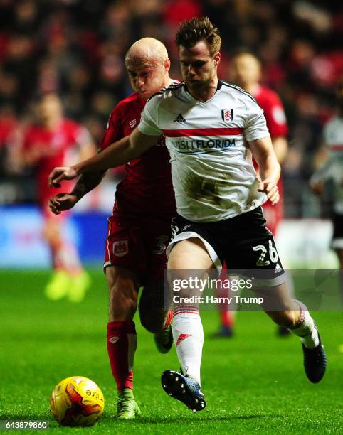 Tomas Kalas of Fulham is tackled by David Cotterill of Bristol City during the Sky Bet Championship match between Bristol City and Fulham at Ashton...