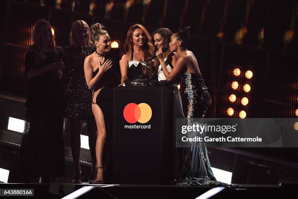Fearne Cotton and Holly Willoughby present Perrie Edwards, Jesy Nelson, Jade Thirlwall and Leigh-Anne Pinnock of Little Mix with the award for Best...