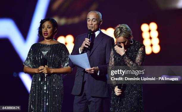 Helen Pepsi DeMacque, Andrew Ridgeley and Shirlie Holliman give a tribute on stage to George Michael at the Brit Awards at the O2 Arena, London.