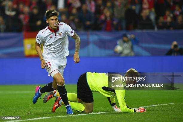 Sevilla's Argentinian midfielder Joaquin Correa celebrates after scoring a goal during the UEFA Champions League round of 16 second leg football...