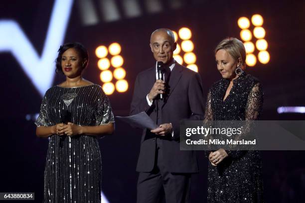 Pepsi DeMacque, Andrew Ridgeley and Shirlie Holliman present a tribute to George Michael on stage at The BRIT Awards 2017 at The O2 Arena on February...