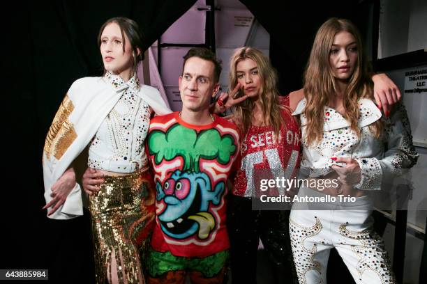 Anna Cleveland , Jeremy Scott , Stella Maxwell and Gigi Hadid poses backstage at Jeremy Scott Fall/Winter 2017 Show during New York Fashion Week at...