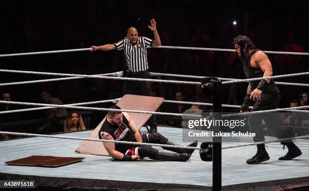 Kevin Owens is attacked by Roman Reigns during to the WWE Live Duesseldorf event at ISS Dome on February 22, 2017 in Duesseldorf, Germany.