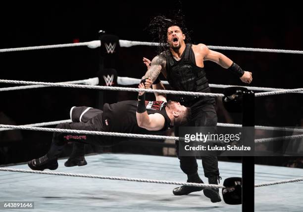 Kevin Owens is attacked by Roman Reigns during to the WWE Live Duesseldorf event at ISS Dome on February 22, 2017 in Duesseldorf, Germany.