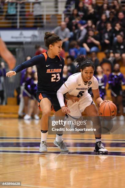 Northwestern Wildcats guard Ashley Deary drives against Illinois Fighting Illini guard Jaelyne Kirkpatrick in the second half during a game between...