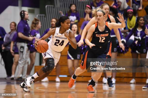 Northwestern Wildcats guard Christen Inman drives against Illinois Fighting Illini guard Ashley McConnell in the first half during a game between the...