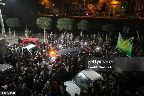 Supporters carry the body of Omar Abdel Rahman, the spiritual leader of the Egyptian extremist Gamaa Islamiya group, during his funeral at...