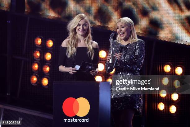 Presenters Fearne Cotton and Holly Willoughby on stage at The BRIT Awards 2017 at The O2 Arena on February 22, 2017 in London, England.