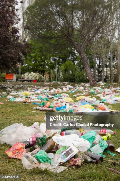 pile of trash on a public park of ciudad universitaria, madrid, spain.jpg - after party garbage stock pictures, royalty-free photos & images