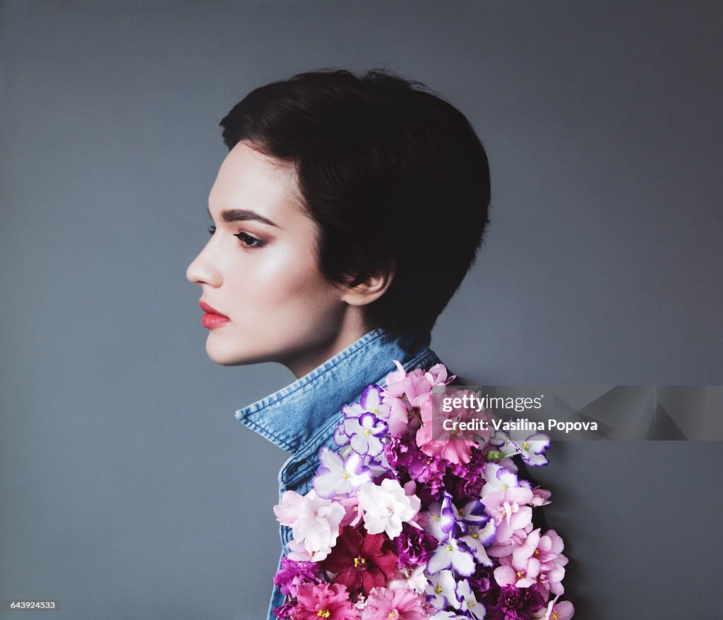 Collage with female portrait and flowers