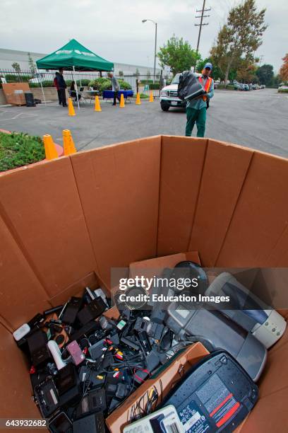 Electronic and computer equipment is sorted and recycled at Sony offices in Carson, California, as part of America Recycles Day on November 15, 2012....