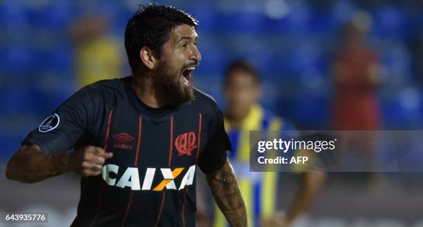 Lucho Gonzalez of Brazil's Atletico Paranaense celebrates the goal he scored against Paraguay's Deportivo Capiata during their Libertadores Cup...