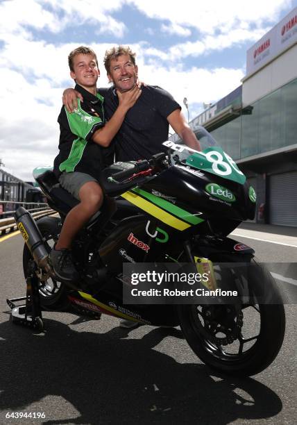 Oli Bayliss rider of the Kawasaki Ninja, poses with his father Troy Bayliss ahead of round one of the FIM World Superbike Championship at Phillip...