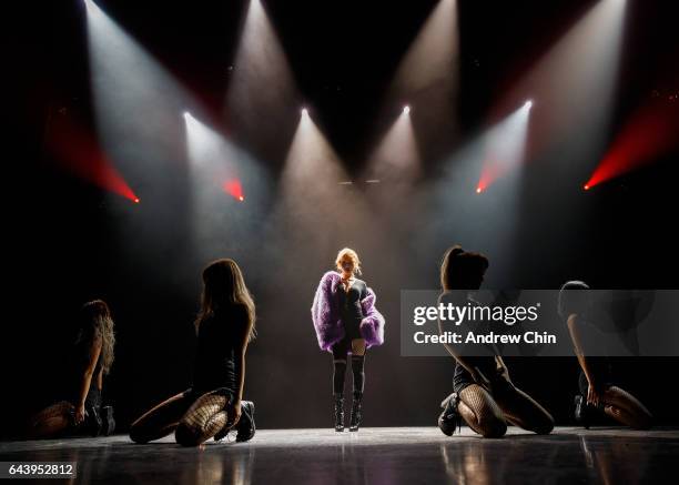 Singer HyunA performs on stage during her "The Queen's Back" North american tour opener at Hard Rock Casino Vancouver on February 22, 2017 in...