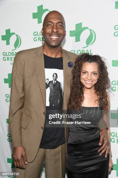 John Salley and Natasha Duffy attend the 14th Annual Global Green Pre Oscar Party at TAO Hollywood on February 22, 2017 in Los Angeles, California.