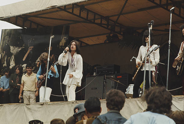 The Rolling Stones, featuring from left, Mick Taylor, Mick Jagger and Keith Richards perform live on stage at The Stones in the Park free festival in...
