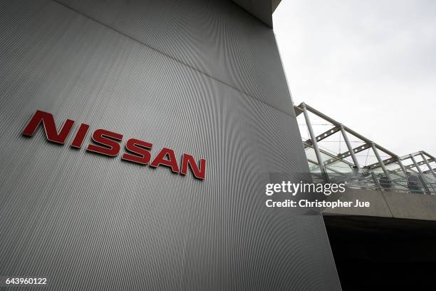 Logo of Nissan is seen outside of the company's global headquarters showroom on February 23, 2017 in Yokohama, Japan. Nissan Motor Co. Announced in a...