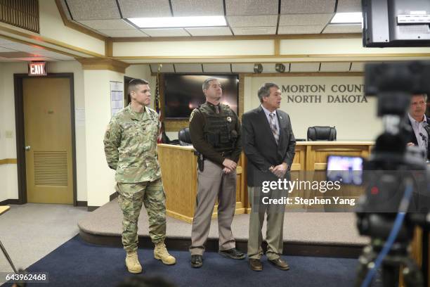 Colonel John Henderson of the Army Corps, Colonel Mike Gerhardt, superintendent of the North Dakota Highway Patrol, North Dakota Attorney General...