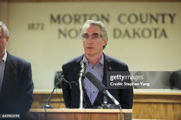 North Dakota Governor Doug Burgum speaks during a press conference announcing plans for the clean up of the Oceti Sakowin protest camp on February...