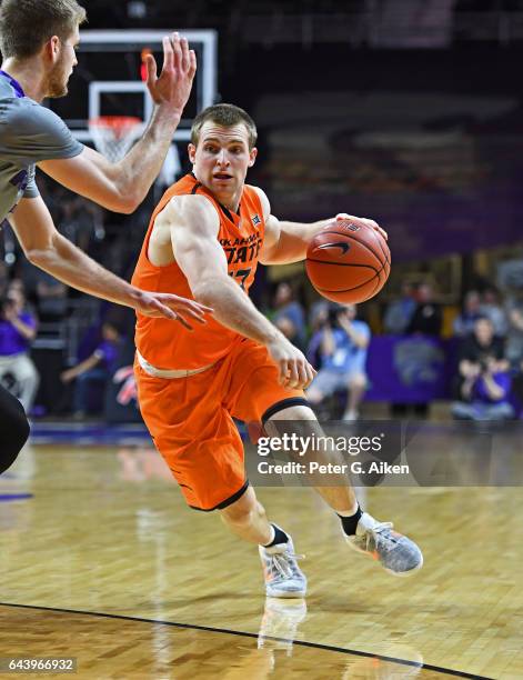 Guard Phil Forte III of the Oklahoma State Cowboys drives with the ball against the Kansas State Wildcats during the first half on February 22, 2017...