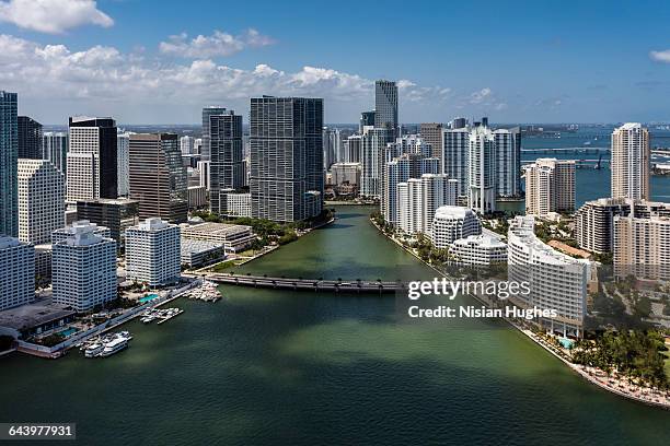 aerial of skyscrapers along miami river - miami sky fotografías e imágenes de stock