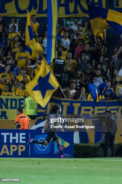 Matias Britos of Pumas celebrates after scoring his team's first goal during the quarterfinals first leg match between Tigres UANL and Pumas UNAM as...