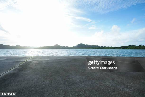 pier with blue sea and sky background - pier - fotografias e filmes do acervo