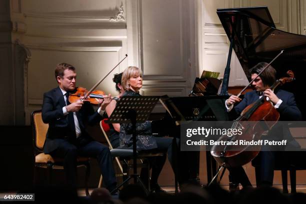 Violinist Renaud Capucon, pianist Helene Mercier and cellist Gautier Capucon perform during the celebration of the 10th Anniversary of the "Fondation...