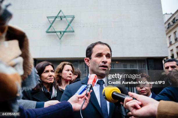 Candidate of the Socialist Party for the 2017 French Presidential Election Benoit Hamon speaks to the media during his visit of the Shoah Memorial on...