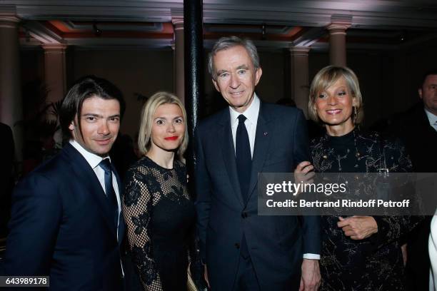 Cellist Gautier Capucon with his wife Delphine and Owner of LVMH Luxury Group Bernard Arnault with his wife pianist Helene Mercier Arnault attend the...