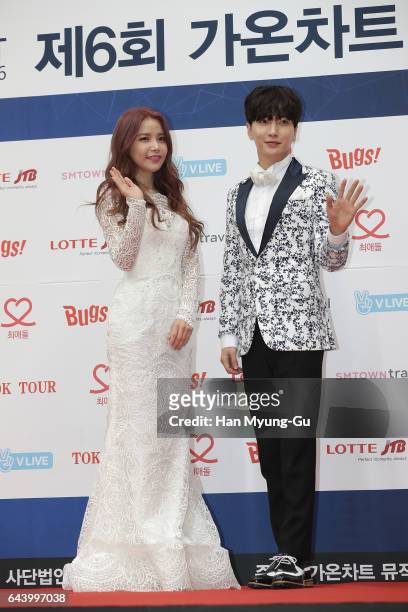 Girl group MAMAMOO and Leeteuk of South Korean boy band Super Junior attend the 6th Gaon Chart K-Pop Awards on February 22, 2017 in Seoul, South...
