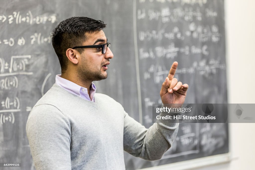 Professor talking in college classroom