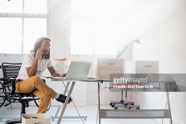 black businessman working in new office - talk phone flat imagens e fotografias de stock