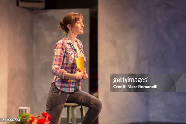 hispanic actress rehearsing on theater stage - theater actress stock pictures, royalty-free photos & images