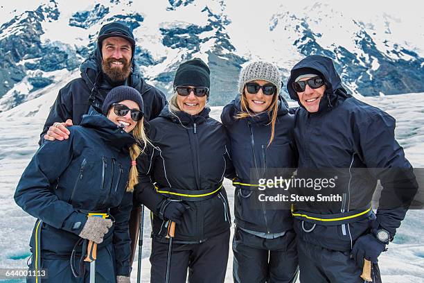 caucasian cross-country skiers smiling in snowy landscape - ski new zealand ストックフォトと画像